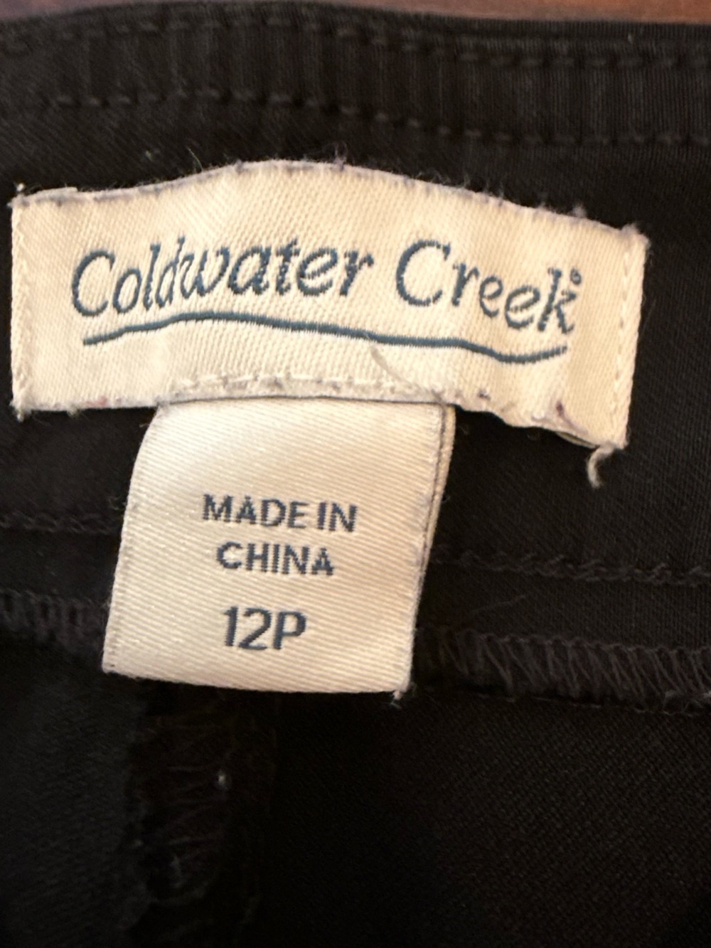 Women's jacket tag - unclear style